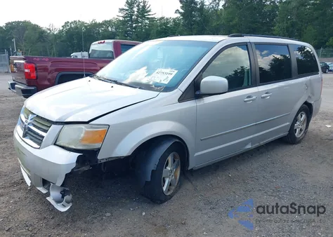 2010 Dodge Grand Caravan Sxt z USA, uszkodzony, nr VIN 2D4RN5D12AR154955
